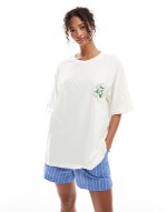 oversized tee with vase back print graphic in ecru