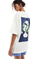 oversized tee with vase back print graphic in ecru
