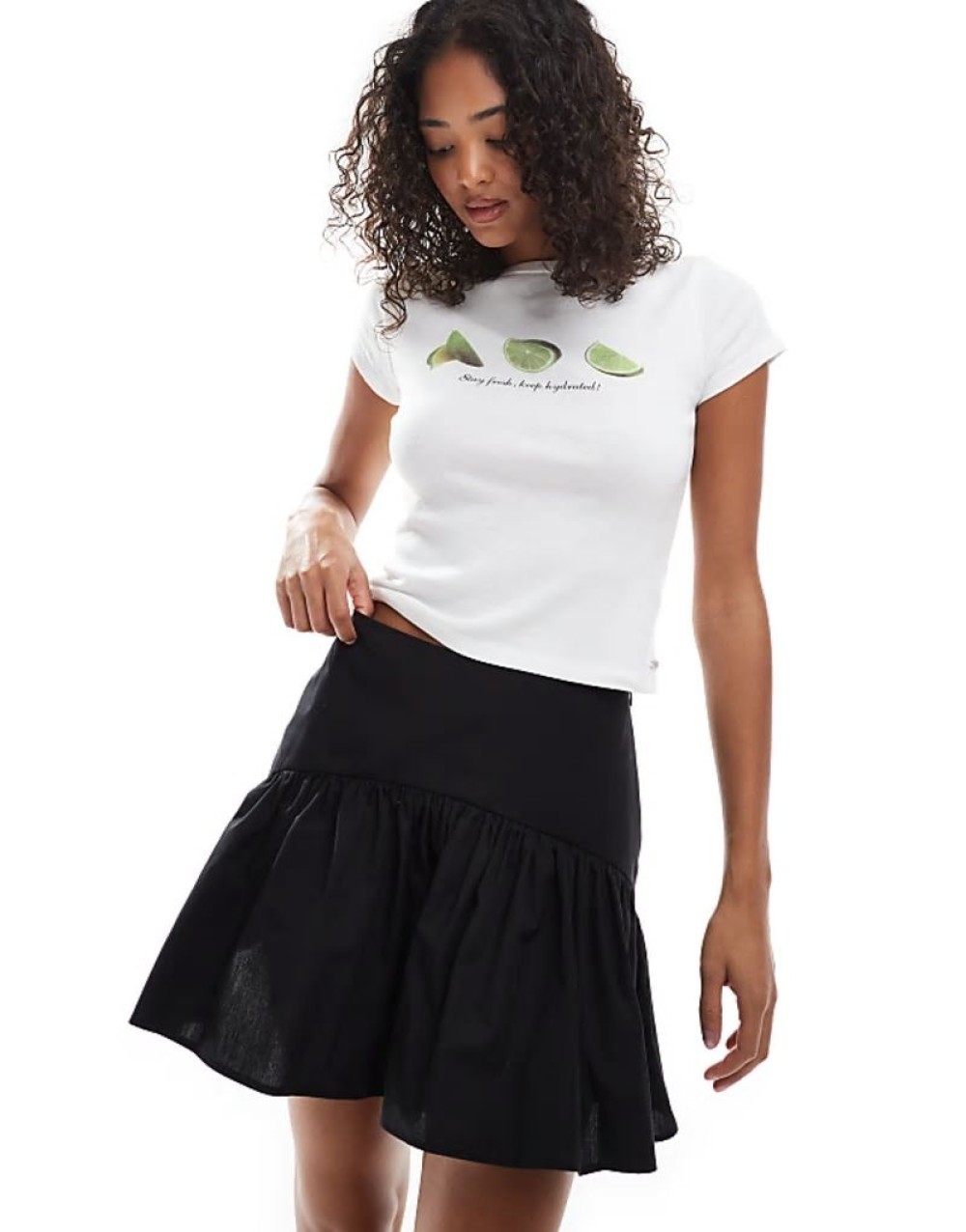 dropped waist mini skirt in black