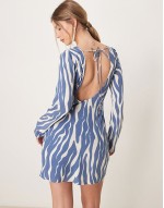 long sve slash neck asymmetric hem mini dress in in blue animal print